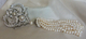 #20 long  pearl brooch