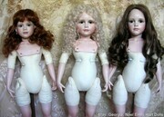 three dolls